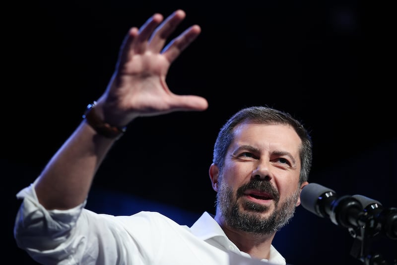Former U.S. Secretary of Transportation Pete Buttigieg speaks during a campaign rally for Virginia Democratic gubernatorial candidate, former Rep. Abigail Spanberger, at the Jefferson Theater October 20, 2025 in Charlottesville, VIrginia.