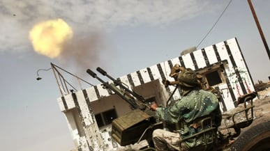 cheats/2011/03/30/gaddafi-gains-upper-hand-in-libya/libya-rebels-hammered_yaldtg