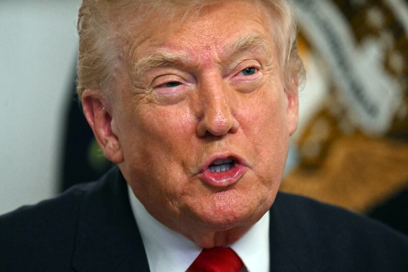 US President Donald Trump participates in a video call with service members from his Mar-a-Lago residence in Palm Beach, Florida, on November 27, 2025, during the Thanksgiving holiday. US President Donald Trump said Thursday that Sarah Beckstrom, one of the two National Guard troops shot a day earlier near the White House, had died, while the other soldier was "fighting for his life."