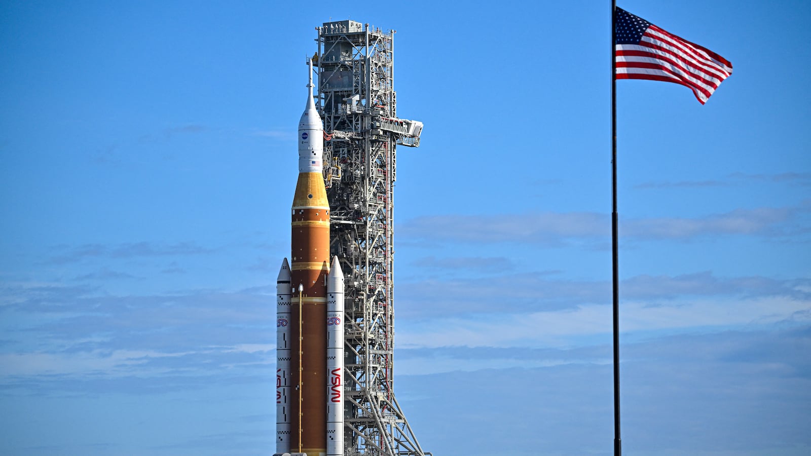 NASA's Artemis II Space Launch System rocket and Orion spacecraft are rolled out of the Vehicle Assembly Building to Launch Pad 39B at Kennedy Space Center in Florida on January 17, 2026, ahead of the crewed lunar mission. (Photo by Miguel J. Rodriguez Carrillo / AFP via Getty Images)