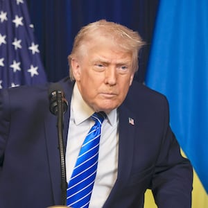 President Donald Trump listens to a question from a reporter during a press conference with Ukrainian President Volodymyr Zelensky following their meeting at Trump’s Mar-a-Lago club on December 28, 2025 in Palm Beach, Florida.
