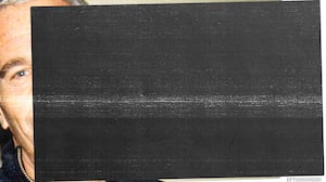 Jeffrey Epstein peeks out from behind a redacted box in The Epstein Files.