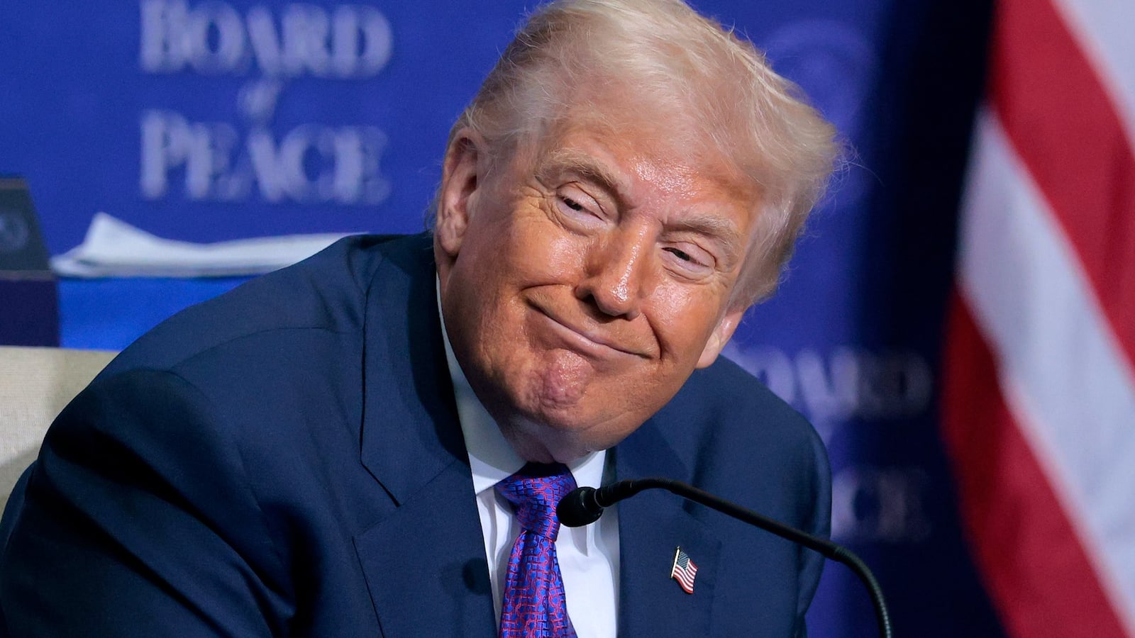 U.S. President Donald Trump looks on during speeches at the inaugural meeting of the Board of Peace at the Donald J. Trump Institute of Peace on February 19, 2026 in Washington, DC.