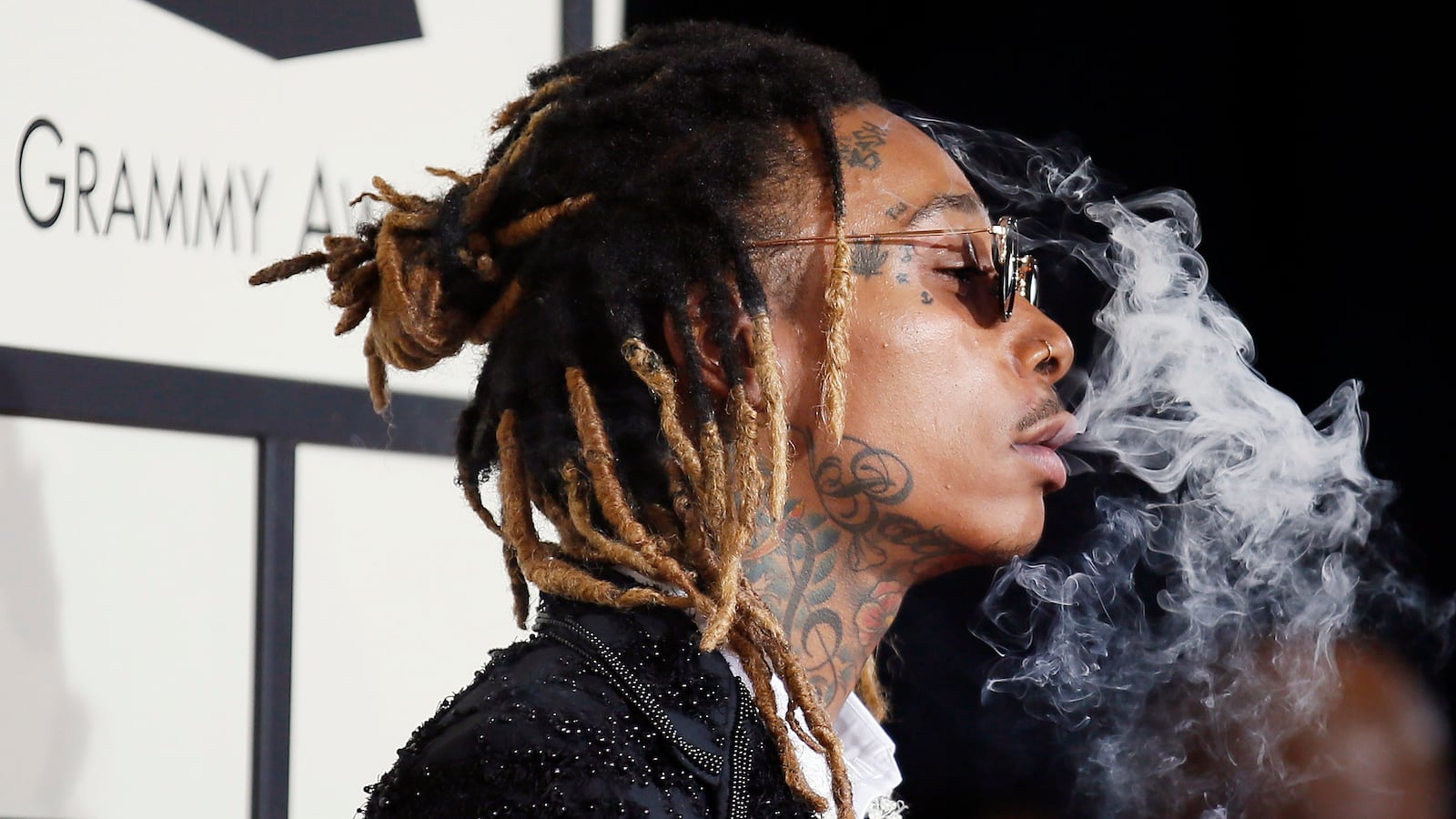 Rapper Wiz Khalifa arrives at the 58th Grammy Awards in Los Angeles, California February 15, 2016.