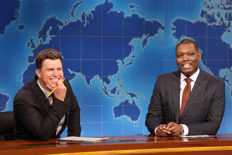 Anchor Colin Jost and anchor Michael Che