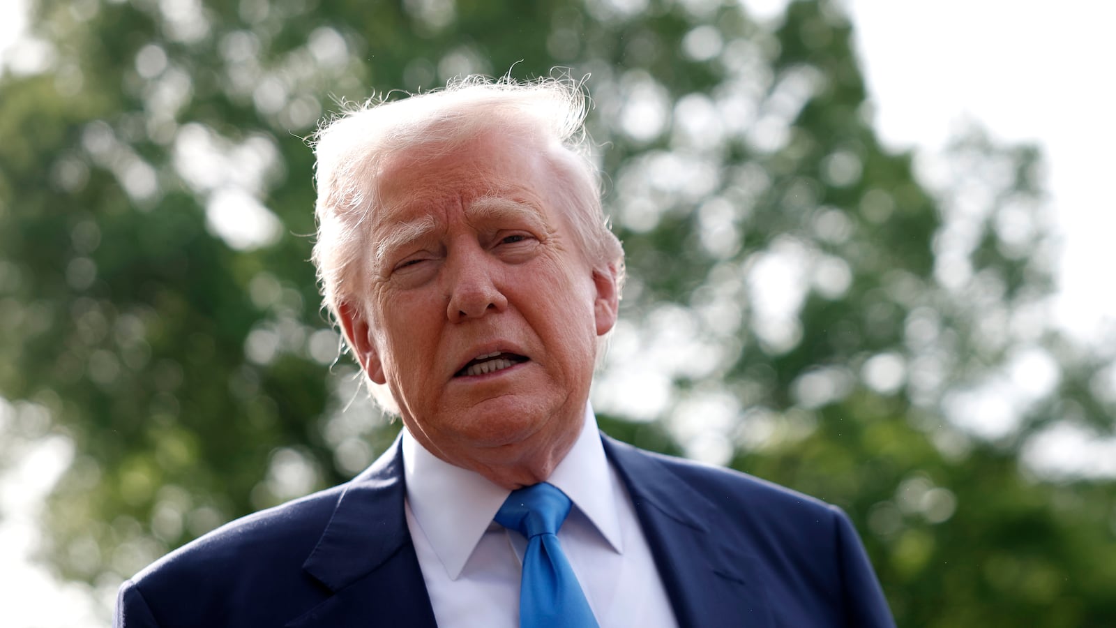 WASHINGTON, DC - APRIL 25: U.S. President Donald Trump speaks to the media as he departs the White House on April 25, 2025 in Washington, DC. President Trump and the first lady are traveling to Rome to attend the funeral of Pope Francis. (Photo by Kevin Dietsch/Getty Images)