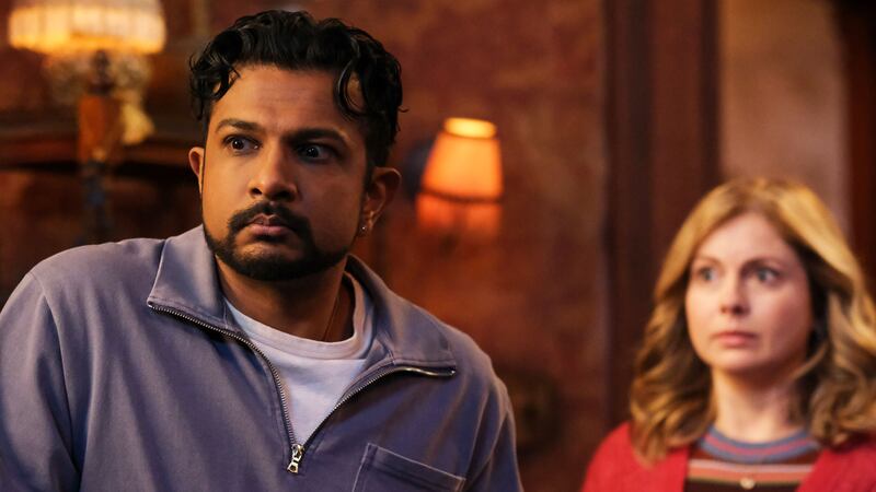 A photo including Utkarsh Ambudkar as Jay and Rose McIver as Samantha in the series Ghosts on CBS