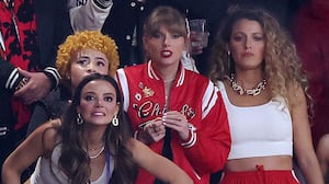 LAS VEGAS, NEVADA - FEBRUARY 11: Miles Teller (2nd L), (4th L-R) Keleigh Teller, Ice Spice, Taylor Swift, Blake Lively, Ashley Avignone and Aric Jones react in overtime during Super Bowl LVIII between the San Francisco 49ers and Kansas City Chiefs at Allegiant Stadium on February 11, 2024 in Las Vegas, Nevada. (Photo by Steph Chambers/Getty Images)