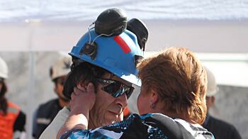 cheats/2010/10/14/rescued-miner-emerges-to-mistress/miner-mistress_oo4r1n