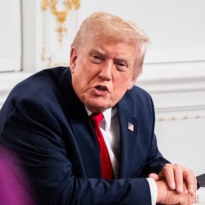 President Donald Trump participates in a call with U.S. service members from his Mar-a-Lago club in Florida on Thanksgiving Day on November 27, 2025 in Palm Beach, Florida.