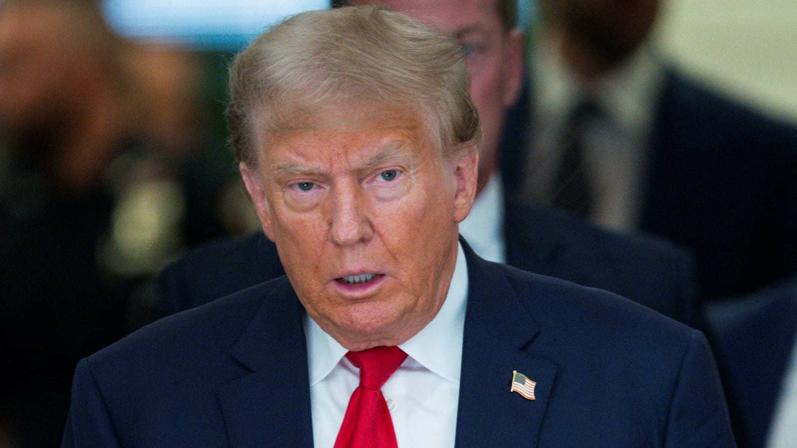 Former U.S. President Donald Trump looks on, as the trial of himself, his adult sons, the Trump Organization and others in a civil fraud case