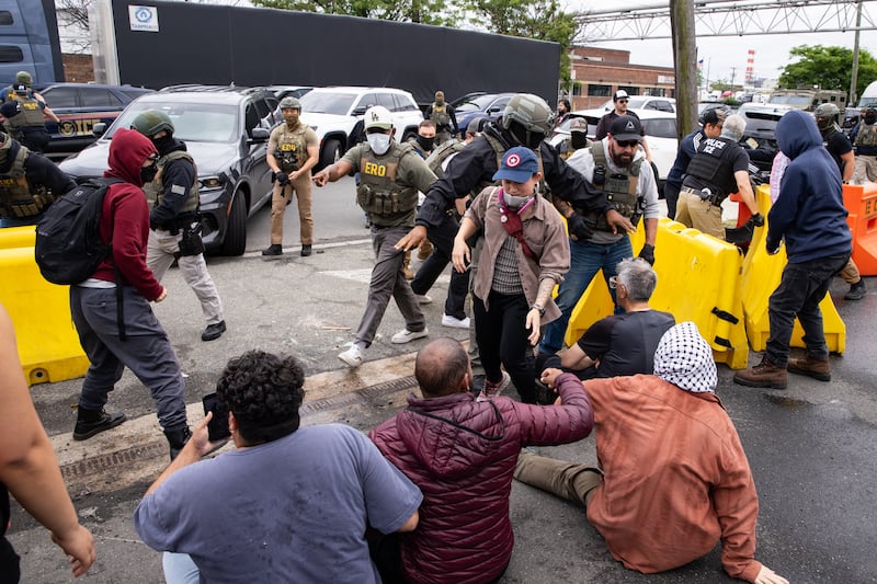 Federal immigration officers clash with Protesters outside Delaney Hall