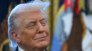 US President Donald Trump looks on during a Mexican Border Defense Medal presentation in the Oval Office of the White House in Washington, DC, on December 15, 2025.