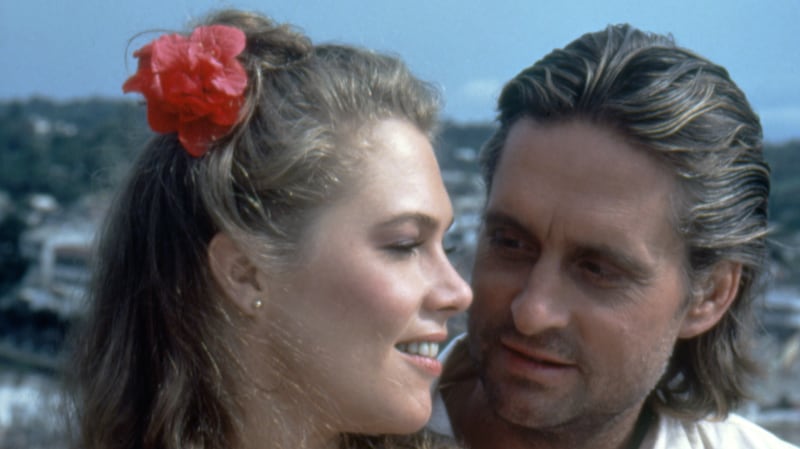 Kathleen Turner and Michael Douglas get close on the set of "Romancing the Stone."