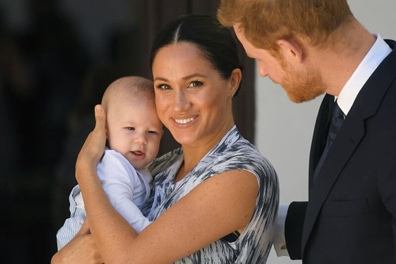 Meghan Markle and Prince Harry with baby Archie.