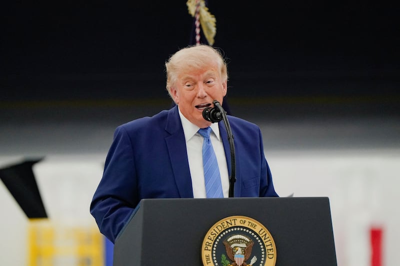 U.S. President Donald Trump delivers a speech as he stands in front of the VC-25B aircraft gifted by Qatar that will be used as Air Force One, at Joint Base Andrews, Maryland, U.S., June 19, 2026.