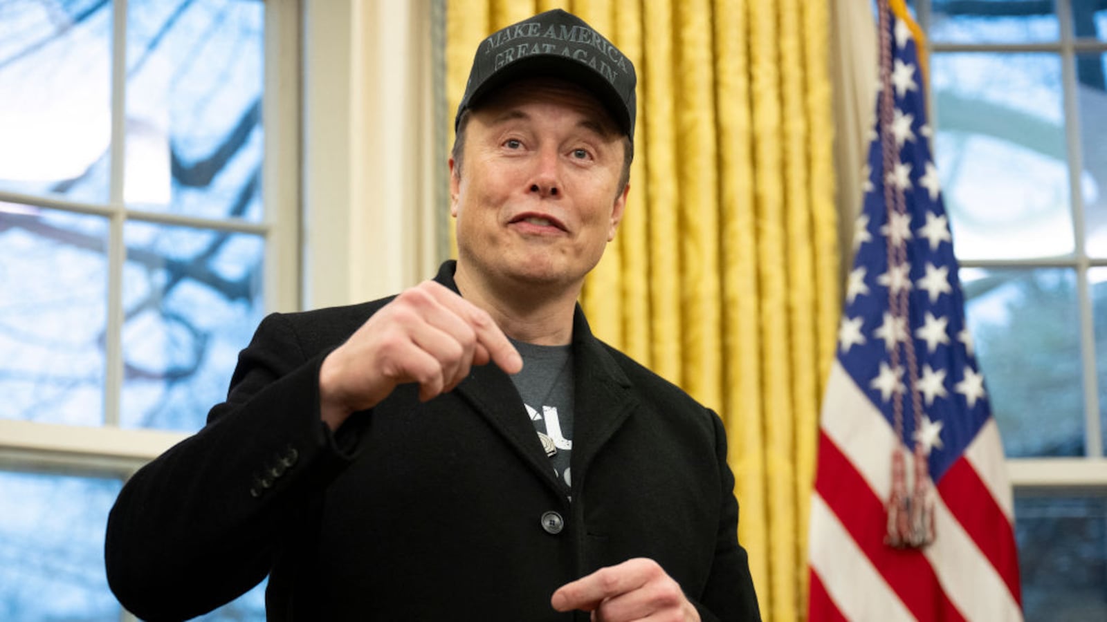 Elon Musk speaks in the Oval Office of the White House in Washington, DC, on February 11, 2025.