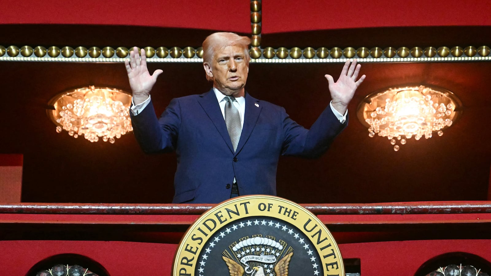 US President Donald Trump stands in the presidential box as he tours the John F. Kennedy Center for the Performing Arts in Washington, DC.