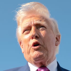 Donald Trump speaks to the media, before boarding Air Force One on his way to Virginia, at Joint Base Andrews in Maryland, U.S., April 10, 2026.