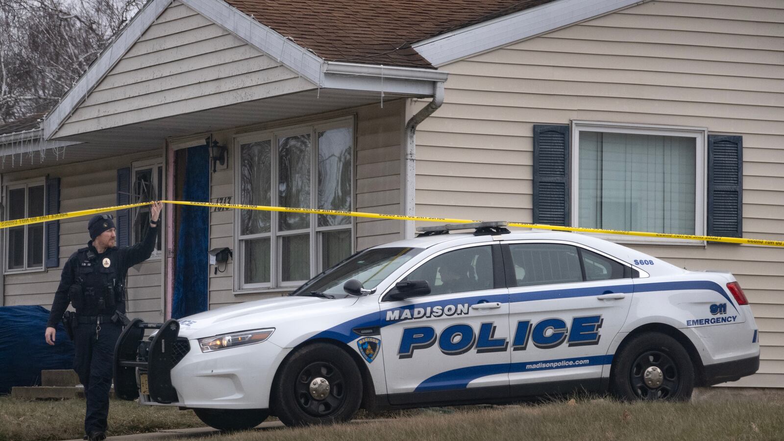 Police stand guard outside the home of 15-year-old Natalie “Samantha” Rupnow on December 17, 2024 in Madison, Wisconsin. Rupnow is reported to have been the student who opened fire at Abundant Life Christian School yesterday.