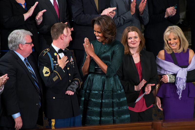 articles/2014/01/29/michelle-obama-wears-alaia-to-state-of-the-union-karen-walker-puts-kenyan-artisans-in-campaign/140129-fashion-cheat-mobama-sotu_pnkmtq