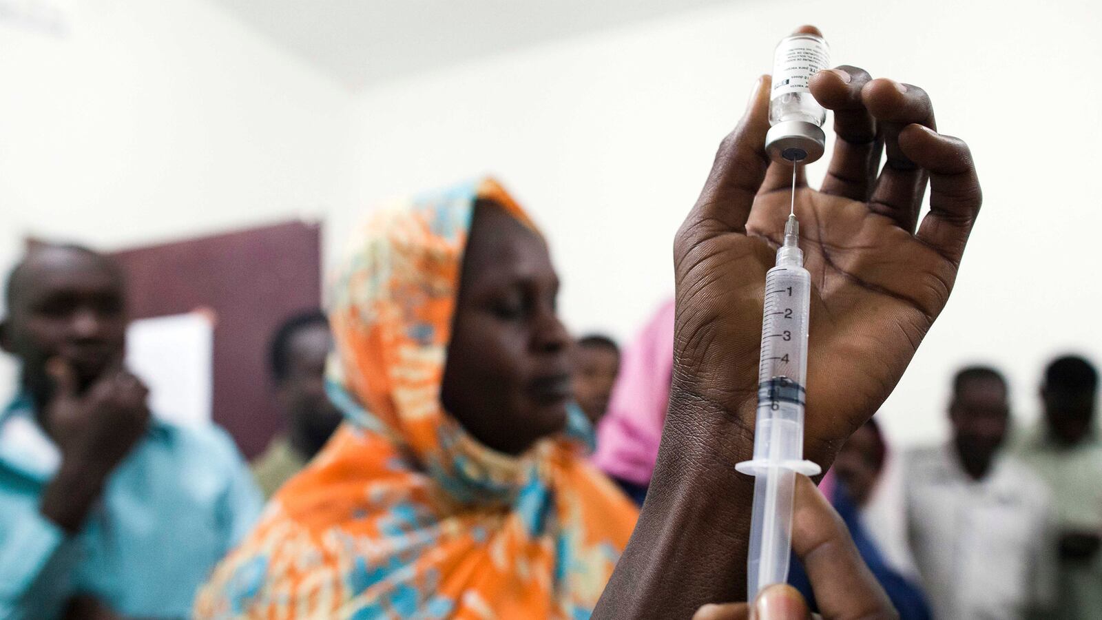 articles/2015/08/31/sudan-s-vaccination-card-black-market/150830-schwartstein-yellow-fever-tease_q2tf0f