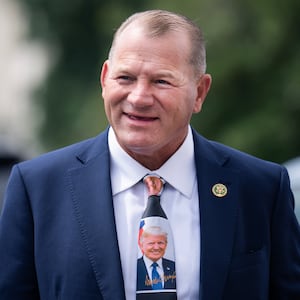 Troy Nehls is routinely seen smoking cigars on Capitol Hill, and once wore gold Trump sneakers and a Trump tie to work.