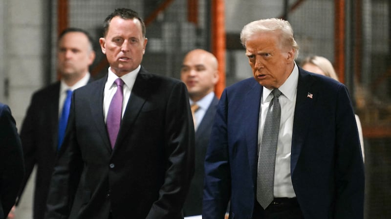 U.S. President Donald Trump, alongside Kennedy Center Board of Trustees president Richard Grenell.