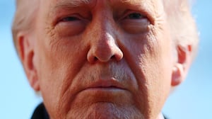 WASHINGTON, DC - FEBRUARY 13: U.S. President Donald Trump talks with reporters as he and first lady Melania Trump leave the White House on February 13, 2026 in Washington, DC. Trump is traveling to Fort Bragg in North Carolina to visit Special Operations troops who were involved in the capture of Venezuelan President Nicolas Maduro before continuing to his private Mar-a-Lago Club in Palm Beach, Florida, for the weekend. (Photo by Michael M. Santiago/Getty Images)