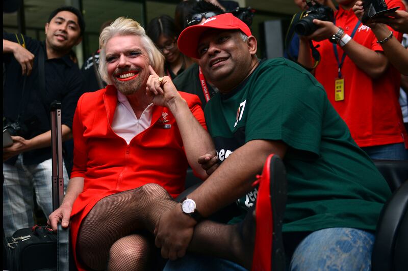 articles/2013/05/13/dakota-and-elle-fanning-to-design-for-rodarte-suri-cruise-is-not-launching-a-fashion-line/130513-branson-embed_qukack