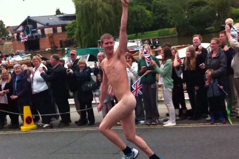 galleries/2012/08/10/nipple-slips-spandex-shocks-more-olympic-wardrobe-mishaps-photos/streaker-torch-relay-olympic-wardrobe-malfunctions_poown4