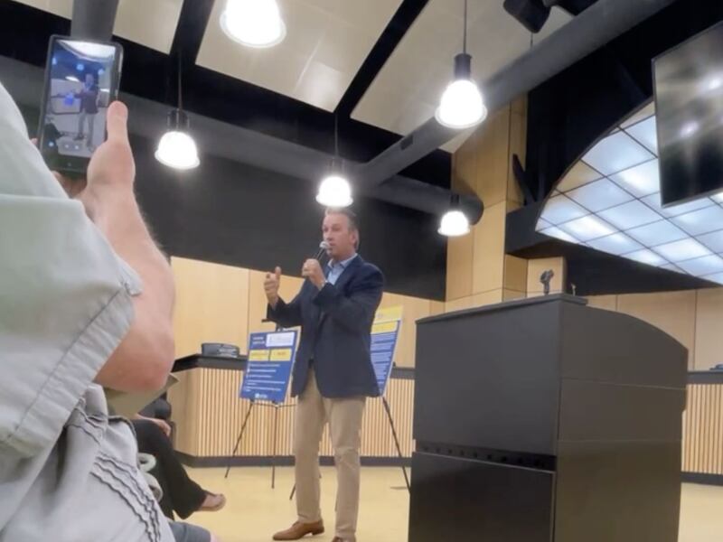 Moore in the midst of being grilled by his constituents.