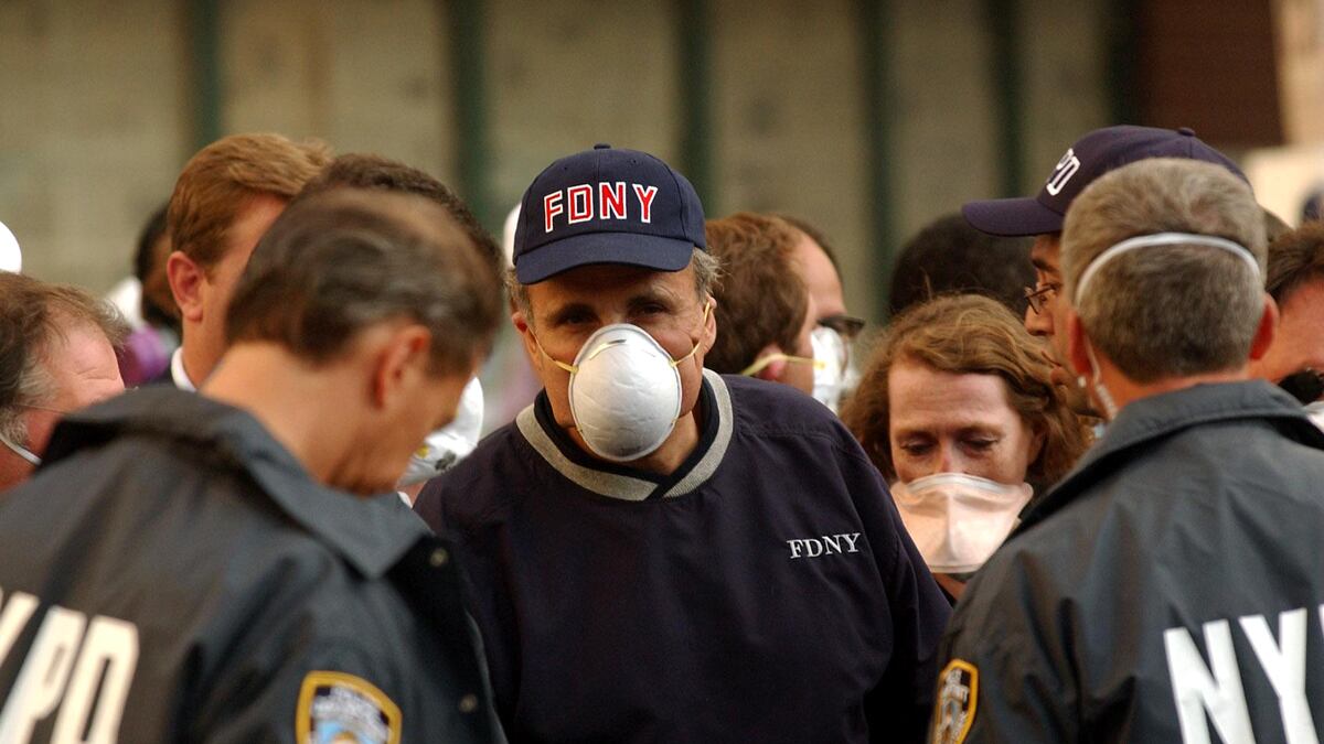 articles/2011/09/11/new-york-police-and-fire-departments-communication-problem/giuliani-9-11-barrett_hf9suk