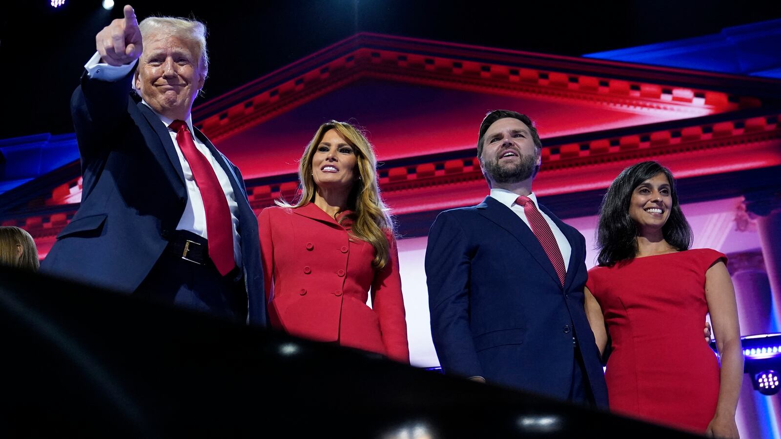 Republican presidential nominee and former U.S. President Donald Trump is joined on stage by wife Melania and Republican vice presidential nominee J.D. Vance and his wife Usha Chilukuri Vance at the Republican National Convention on July 18, 2024.
