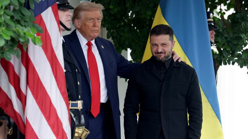 President Donald Trump greets Ukrainian President Volodymyr Zelensky