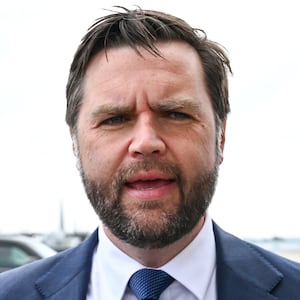 U.S. Vice President JD Vance speaks to the press as second lady Usha Vance looks on at Minneapolis Saint Paul International Airport after paying their respects to victims of the Annunciation Catholic Church shooting on September 3, 2025 in St Paul, Minnesota.