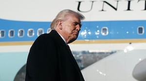 FORT BRAGG, NORTH CAROLINA - FEBRUARY 13: U.S. President Donald Trump speaks with the media before boarding Air Force One at Pope Army Airfield after a visit to the Fort Bragg U.S. Army base on February 13, 2026 in Fort Bragg, North Carolina. Trump visited the base to honor special forces involved in the military operation in Venezuela in early 2026. (Photo by Nathan Howard/Getty Images)
