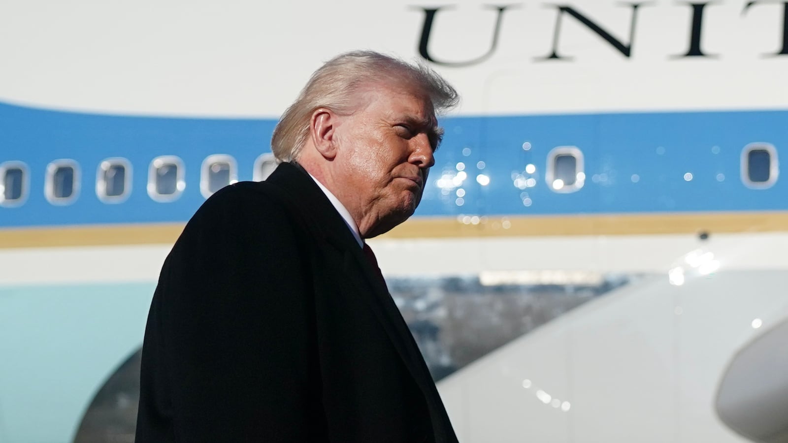 FORT BRAGG, NORTH CAROLINA - FEBRUARY 13: U.S. President Donald Trump speaks with the media before boarding Air Force One at Pope Army Airfield after a visit to the Fort Bragg U.S. Army base on February 13, 2026 in Fort Bragg, North Carolina. Trump visited the base to honor special forces involved in the military operation in Venezuela in early 2026. (Photo by Nathan Howard/Getty Images)