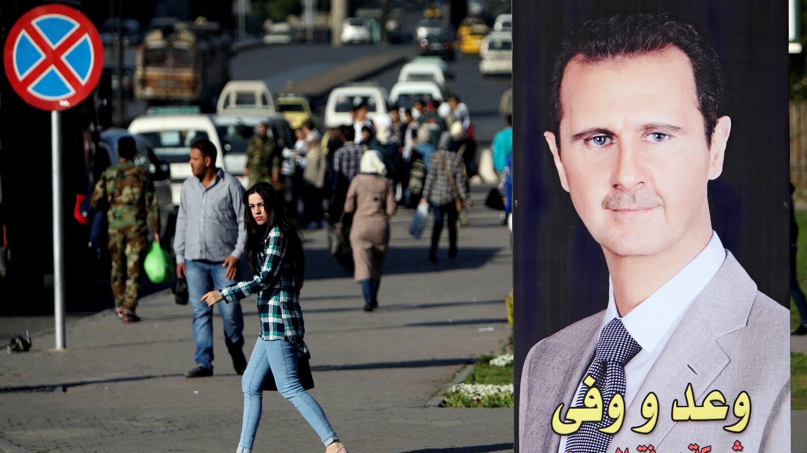 180415-syria-assad-good-mood-cheat_vf373i