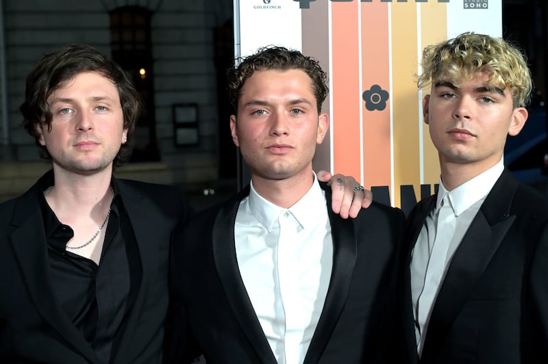 Sadie Frost's three sons, Finlay Munro Kemp, Rafferty Law, and Rudy Law, attend "Quant" premiere in London in 2021.