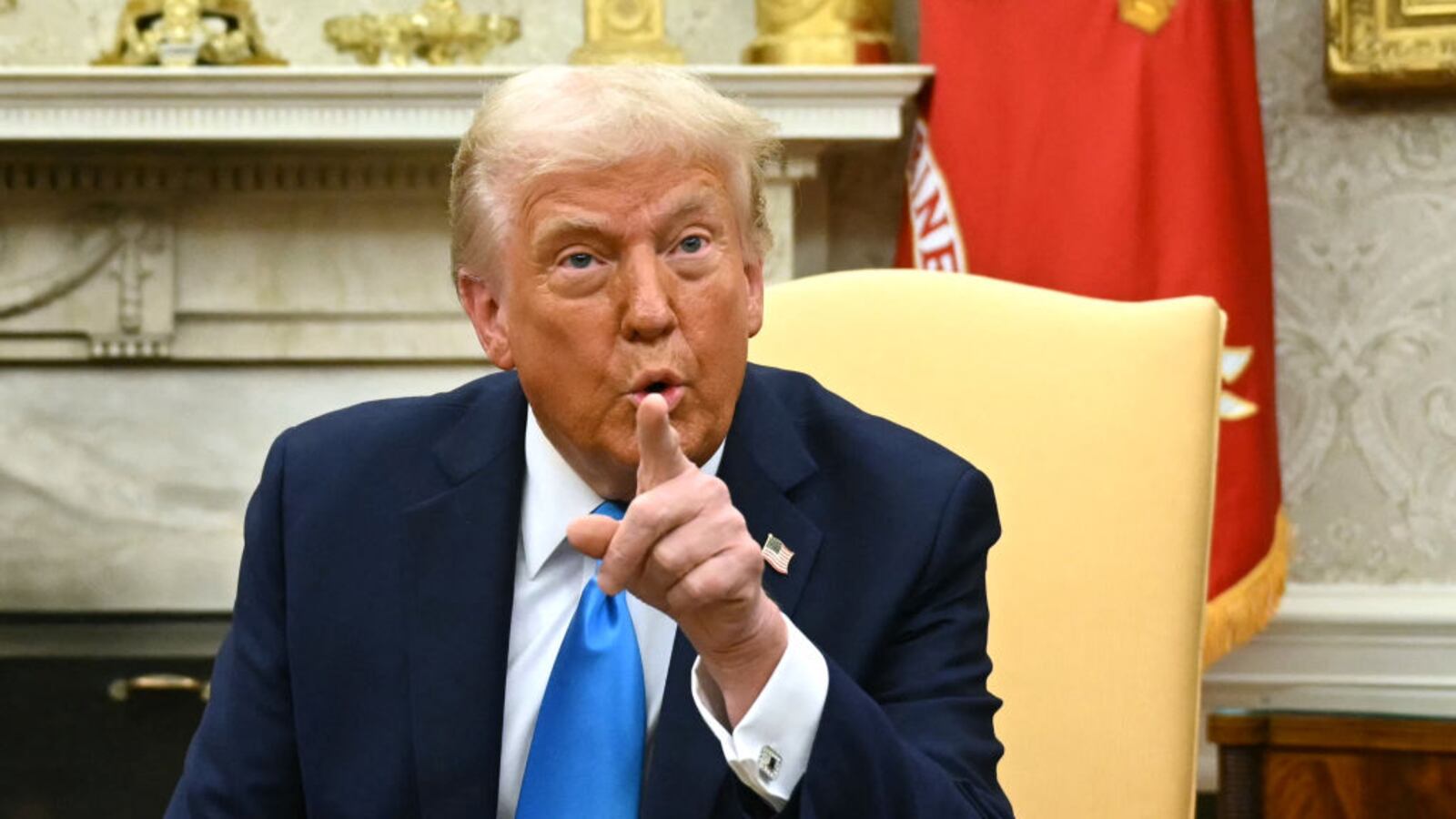 US President Donald Trump points during a meeting with Israel's prime minister in the Oval Office of the White House in Washington, DC, on February 4, 2025.