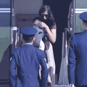 Usha Vance trips down the stairs on Marine One while carrying her infant child on Oct. 5, 2026.