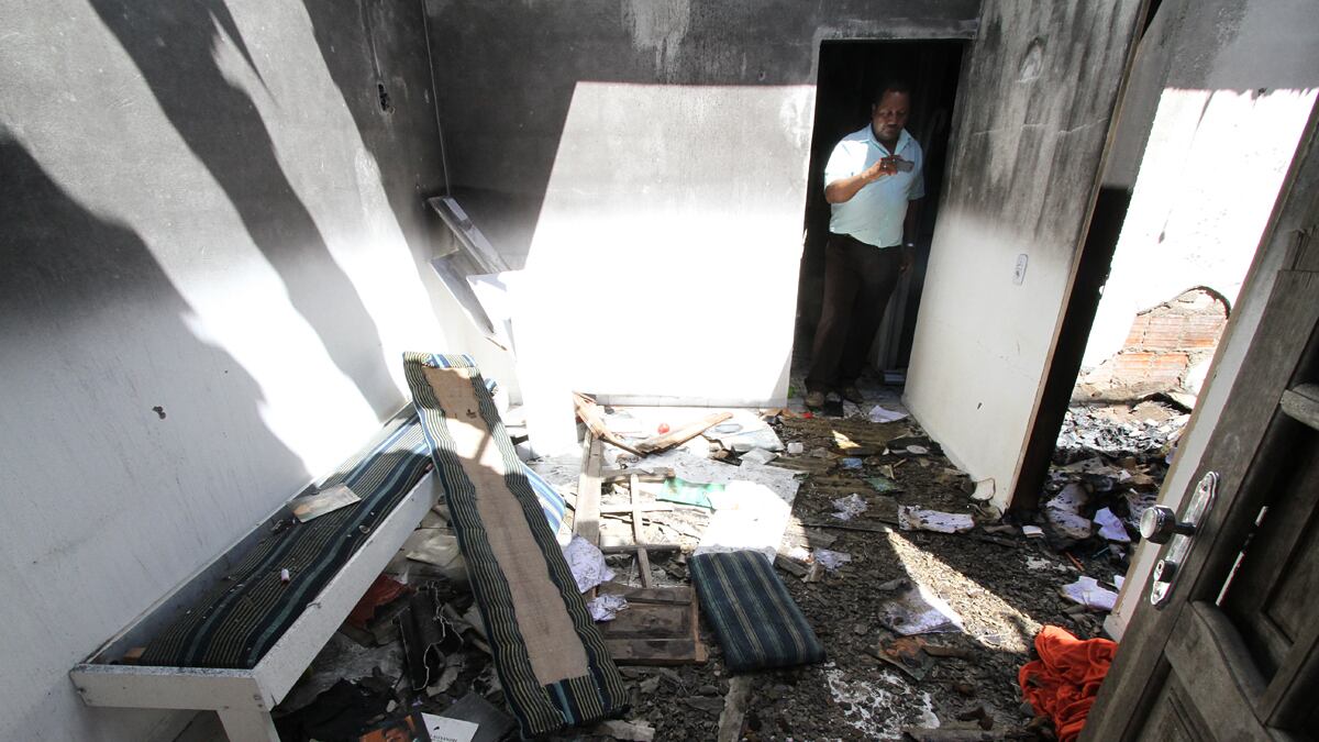 articles/2012/04/18/a-brazilian-man-and-two-women-are-accused-of-murder-and-cannibalism/cannibal-house-margolis_cqan4w