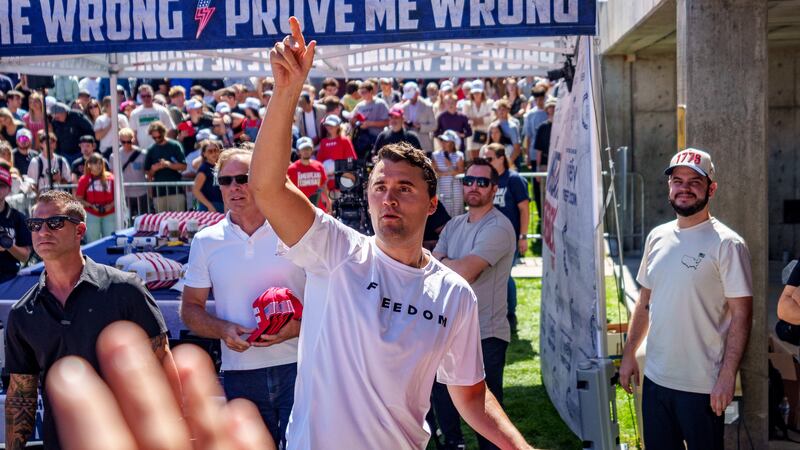 OREM, UTAH - SEPTEMBER 10: Charlie Kirk throws hats to the crowd after arriving at Utah Valley University on September 10, 2025 in Orem, Utah. Kirk, founder of Turning Point USA, was speaking at his "American Comeback Tour" when he was shot in the neck and killed. (Photo by Trent Nelson/The Salt Lake Tribune/Getty Images)