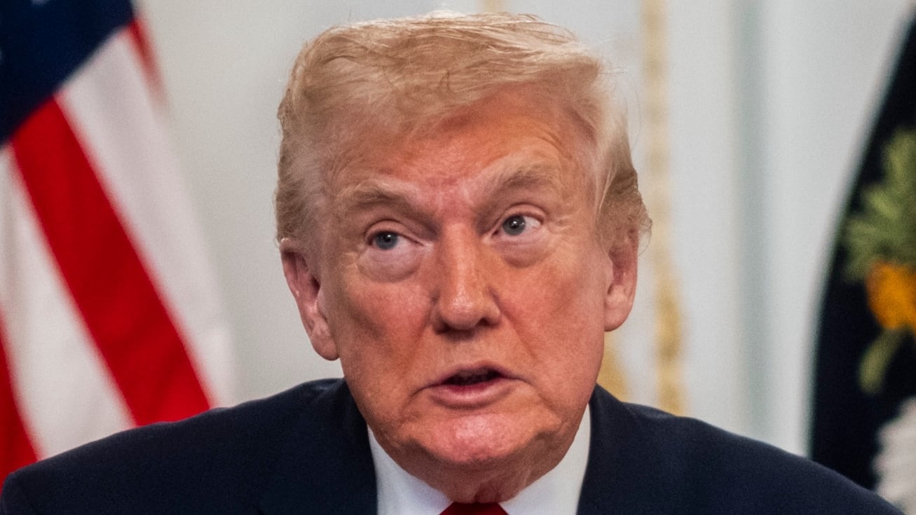 PALM BEACH, FLORIDA - NOVEMBER 27: President Donald Trump participates in a call with U.S. service members from his Mar-a-Lago club in Florida on Thanksgiving Day on November 27, 2025 in Palm Beach, Florida. (Photo by Pete Marovich/Getty Images)