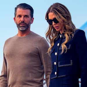 Donald Trump Jr., son of U.S. President Donald Trump and his girlfriend Bettina Anderson arrive with U.S. President Donald Trump at Andrews Air Force Base, Maryland on July 29, 2025 before boarding Marine One for a short trip to the White House.