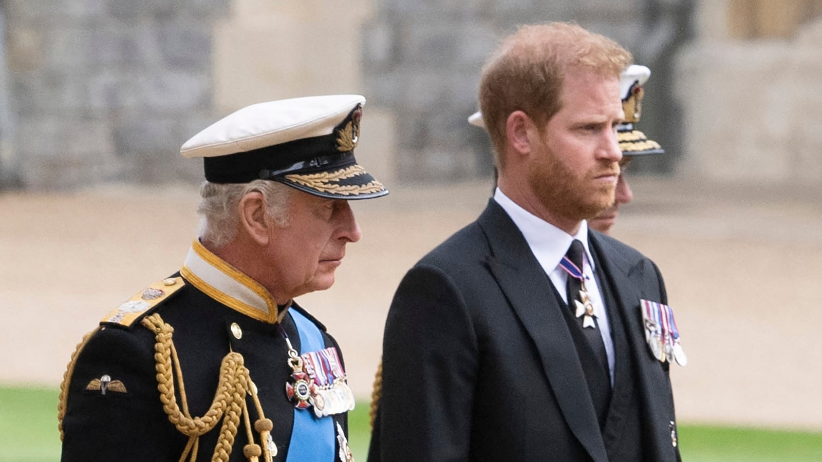 King Charles III walks with Prince Harry as they arrive at St George’s Chapel inside Windsor Castle on September 19, 2022.