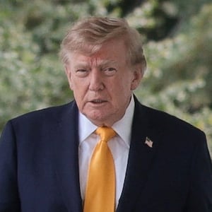 U.S. President Donald Trump walks as he attends to host a back-to-school-themed event to highlight his administration's education policies, in the Rose Garden at the White House in Washington, D.C., U.S., August 24, 2026.