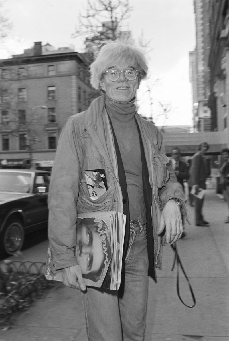 American artist Andy Warhol at the Coe Kerr Gallery opening for artist Jamie Wyeth held on May 2, 1984. From the gallery, guests moved to Mortimer's for a dinner hosted by Nan Kempner.