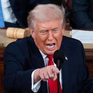 President Donald Trump delivers his State of the Union address in the House Chamber of the U.S. Capitol on Tuesday, February 24, 2026. Vice President JD Vance, left, and Speaker of the House Mike Johnson, R-La., also appear.